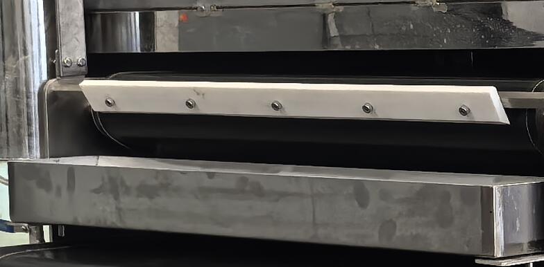 contact cooker scraper